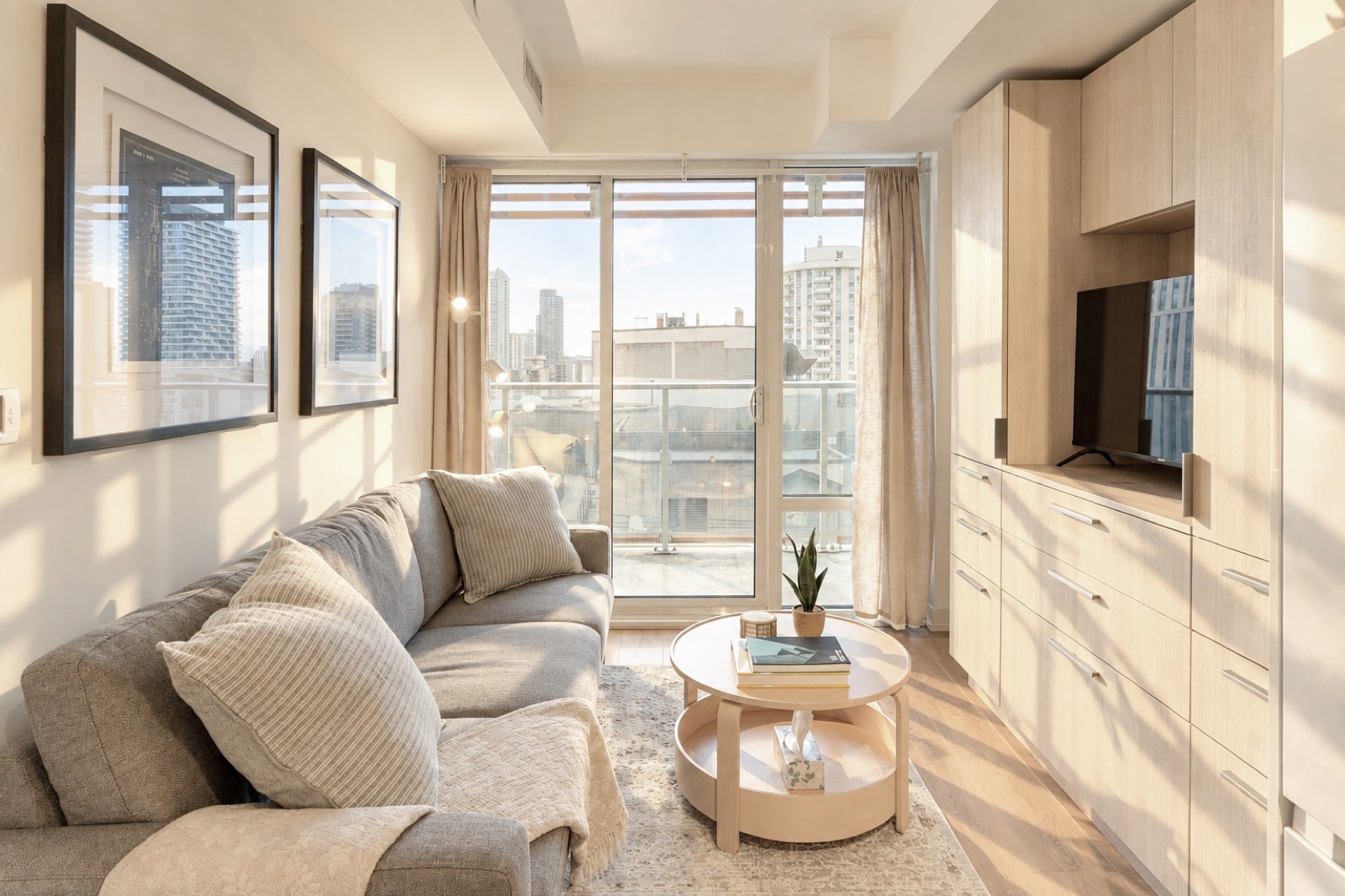The same living room furnished and styled