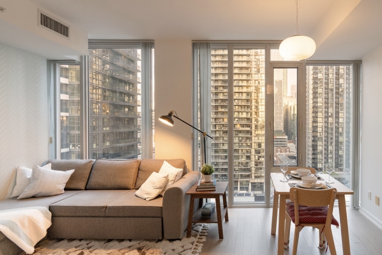 Entertainment District living and dining area with city views